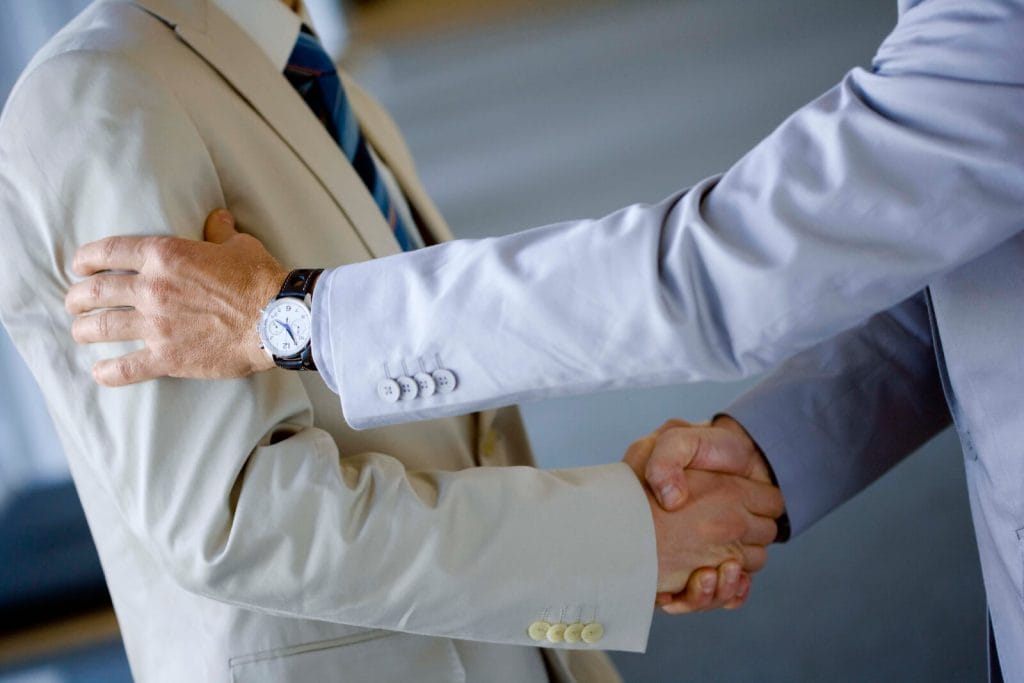 businessmen shaking hands 2286853 copy 1 1024x683 1